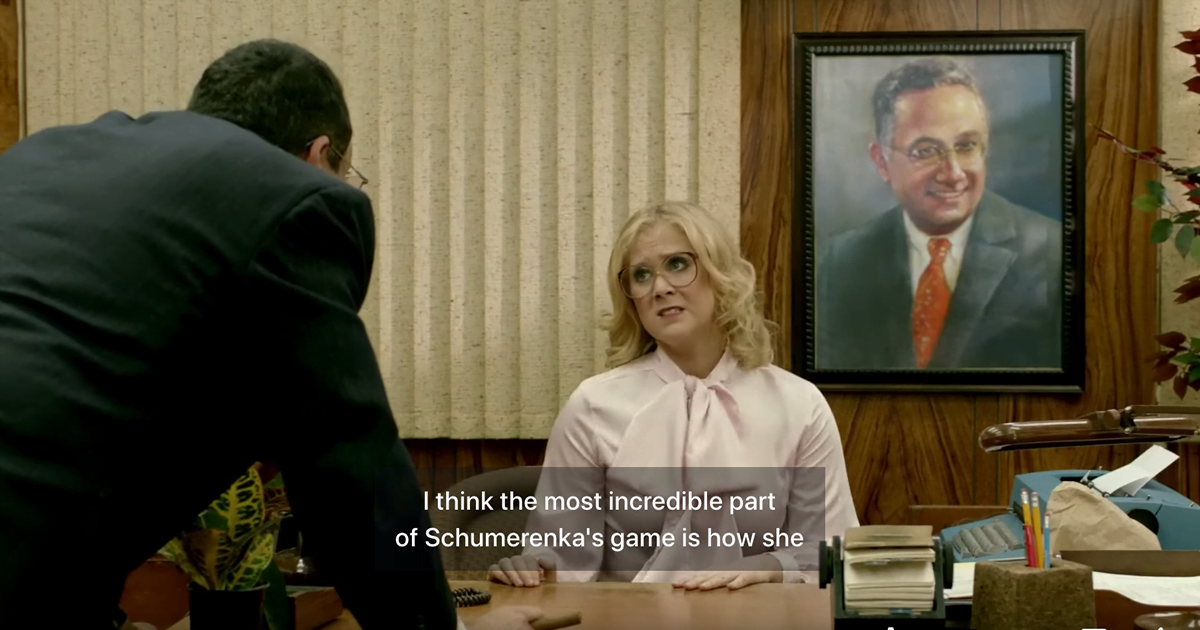 A screenshot from the Inside Amy Schumer sketch 1970s Secretary. The caption is clearly from a sketch about a tennis match.